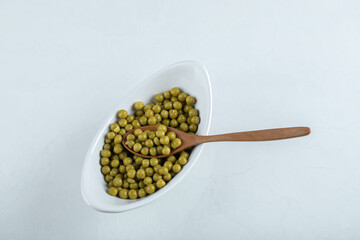 Wide angle photo. Marinated olive in white ceramic bowl