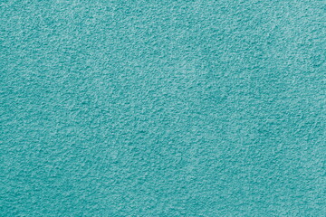 Grainy Blue Plaster Wall Texture Material Bg. Abstract Light Turquoise Cement Stucco Grunge Facade Interior.