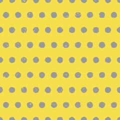 Yellow and gray textured polka dot background in colors of the year 2021. Seamless pattern with gray circles