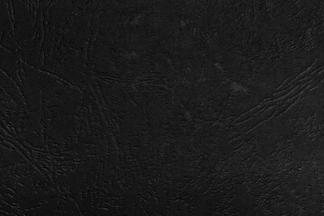Matt textured paper with embossed, charcoal black color. 