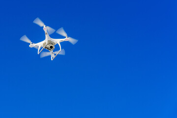 drone flight in the blue sky