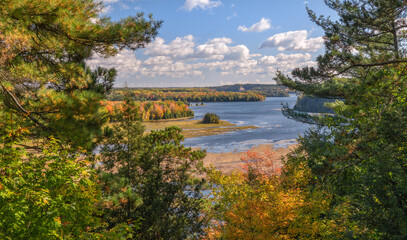 Fototapeta na wymiar Autumn colors in the Huron Manistee National Forests along the Ausable River 