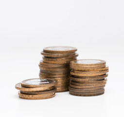 isolated stacks of coins on the white background