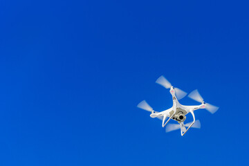 Drone flight in the blue sky