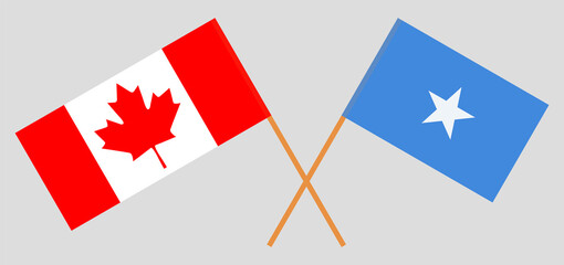 Crossed flags of Canada and Somalia. Official colors. Correct proportion
