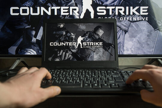 PC gaming. Playing Counter Strike: Global Offensive video game on computer. CS: GO
