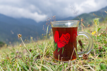 Obraz premium Hot tea enjoyment in the Black Sea plateaus