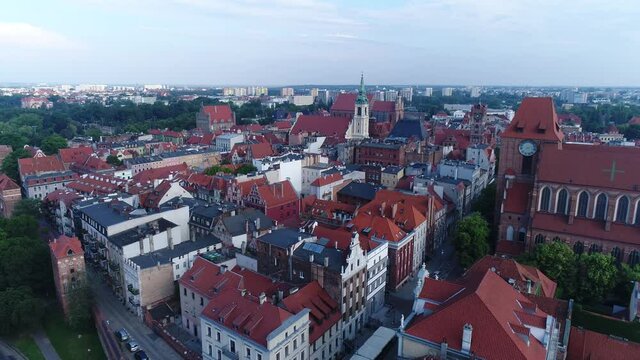 Old Town of Toruń from a great height with a drone. Atmospheric tenement houses in the foreground and the Old Town Square in the background.