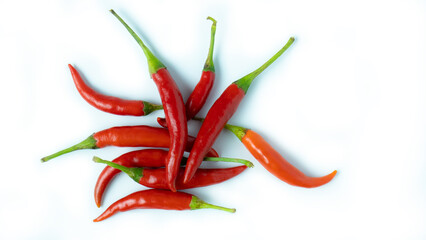 Red hot chilli peppers on white background. Close up. A backdrop of Red hot chilli peppers.