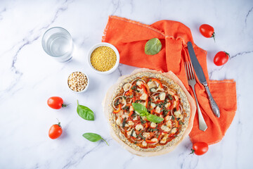 Millet pine nuts Chia seeds pizza crust with tomato; red bell pepper, onion and basil