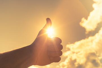 Thumbs up feeling positive and energized 