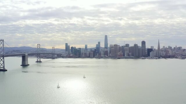Aerial: panorama of the city and the bridge, drone view