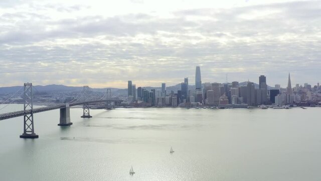 Aerial: bridge and city view by the bay area. drone view