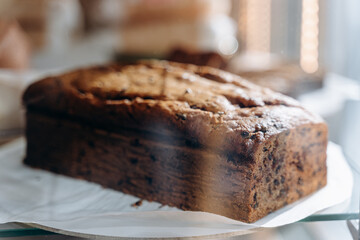 Fresh fragrant ecological bread behind glass