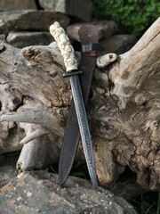knife on a wooden background
