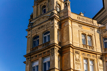 Romantic neo-renaissance stately townhouse, Art Nouveau facade, historical building in old town, most prestigious boulevard Parizska Street at sunny day, Prague, Czech Republic