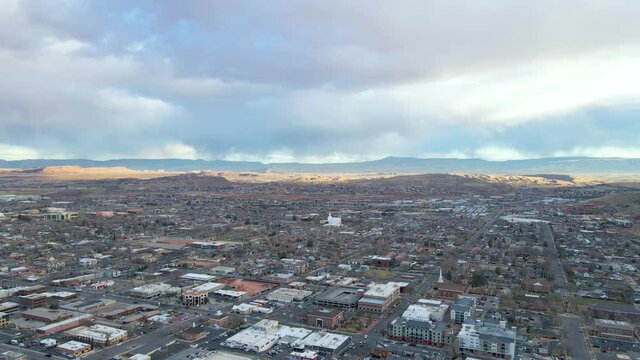 St. George city and Mormon Temple in downtown, Utah. Aerial backward