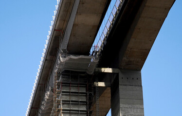 Scaffolding on a reinforced concrete bearing structure of a motorway viaduct