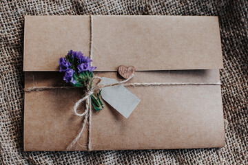 Two craft paper postal envelope with multicolor sweet sugar candy hearts. Love message or gift...