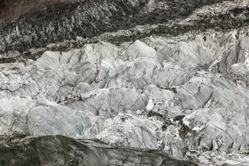 Fototapeta na wymiar Massive glacier ice field in mountains. High quality photo