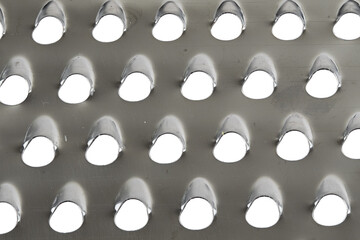 macro image of a cheese grater