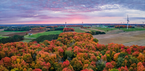 Autumn sunrise with wind turbines in central Michigan farmland near Cadillac Michigan