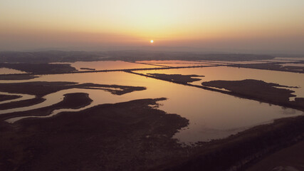 Fototapeta na wymiar Aerial drone view of Sunset over lake. Beautiful landscape.