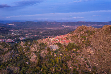 Drone aerial panorama view of Monsanto historic village at sunset, in Portugal