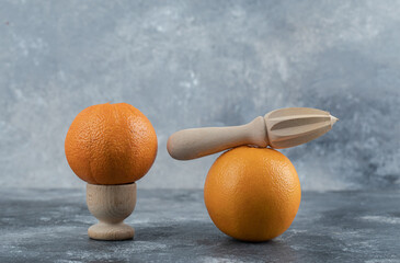 Delicious two oranges on marble background