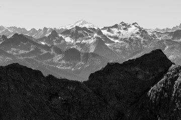 Jagged and rough north cascades mountain range with snow-capped peaks © meghann