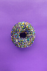 Donuts with sprinkles isolated on background