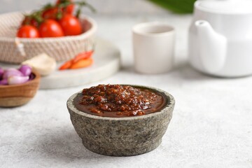 Sambal is one of Indonesian signature condiment, made from chili, garlic, shallot, and tomato.