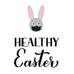 Healthy Easter calligraphy hand lettering with masked bunny. Easter celebration due covid pandemic typography poster. Vector template for greeting card, banner, sticker, etc
