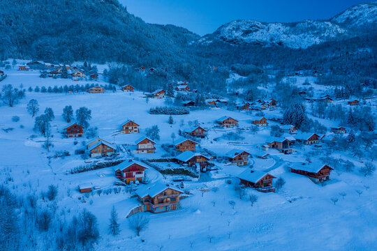 Aerial view of wooden chalets in the French Alps, Onnion, France.