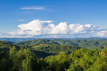 Fototapeta na wymiar View from Mount Kablar, western Serbia. Beautiful landscape, hills and amazing cloud.