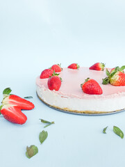 Creamy mascarpone cheese cake with strawberry . Piece of New York Cheesecake. Close up. Christmas dessert. Healthy food. Flat lay creative food concept.