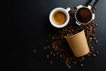 Coffee beans and espresso on dark background