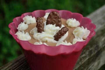 Elicious Caramel Pudding Decorated With Chocolate Cookies And Cream