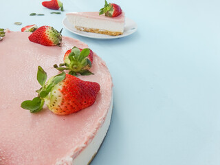 Creamy mascarpone cheese cake with strawberry . Piece of New York Cheesecake. Close up. Christmas dessert. Healthy food. Flat lay creative food concept.
