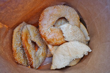 Fresh bagels in a paper bag