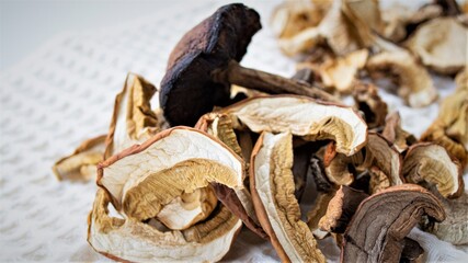 Dried mushrooms on a kitchen waffle towel