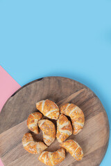 Fried mutaki cookies on a wooden board