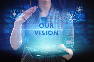 Business, Technology, Internet and network concept. Young businessman working on a virtual screen of the future and sees the inscription: Our vision