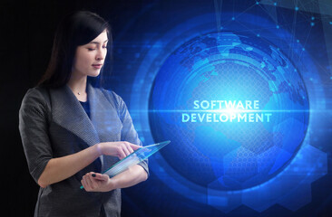 Business, Technology, Internet and network concept. Young businessman working on a virtual screen of the future and sees the inscription: Software development