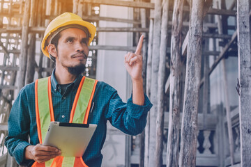 Engineer use tablet inspection building project real estate constriction site