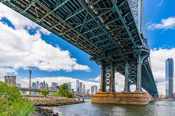 Manhattan Bridge over East River, Manhattan downtown and waterfront condominium Manhattan New York City Wide angle view