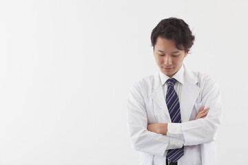 Asian doctor thinking about his patients