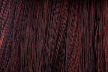 Texture women's wet hair. Close-up of human hair. Beautiful long female hair as background