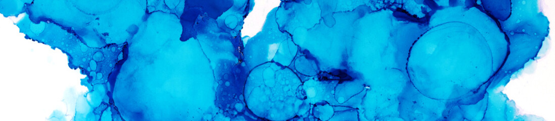 Blue and green Alcohol ink on white background. 