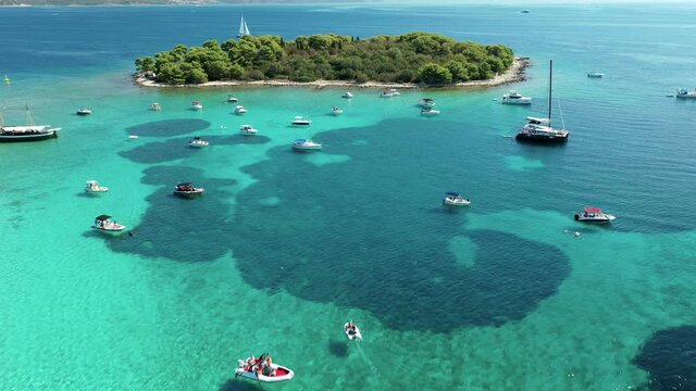 Aerial Of Boats Anchored In Blue Lagoon Near Krknjas Mali Island In Adriatic Sea, Croatia.